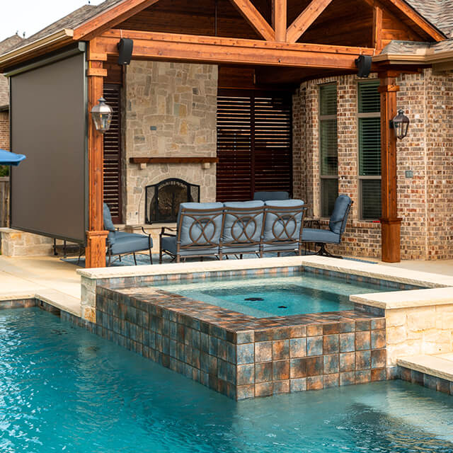 bmrpoolandpatio28 a pool and arbor at night